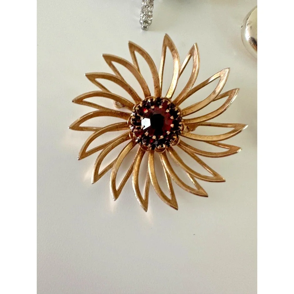 The Unbranded Brand brooch painted